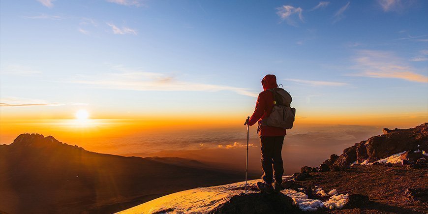 Complete Kilimanjaro climbing gear laid out for packing